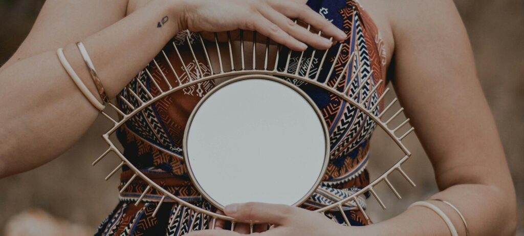 woman in blue and white floral dress