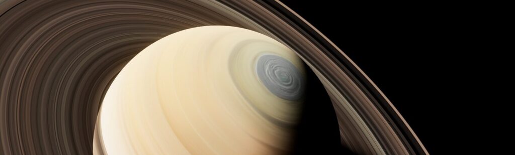 a close up of a saturn planet with a black background