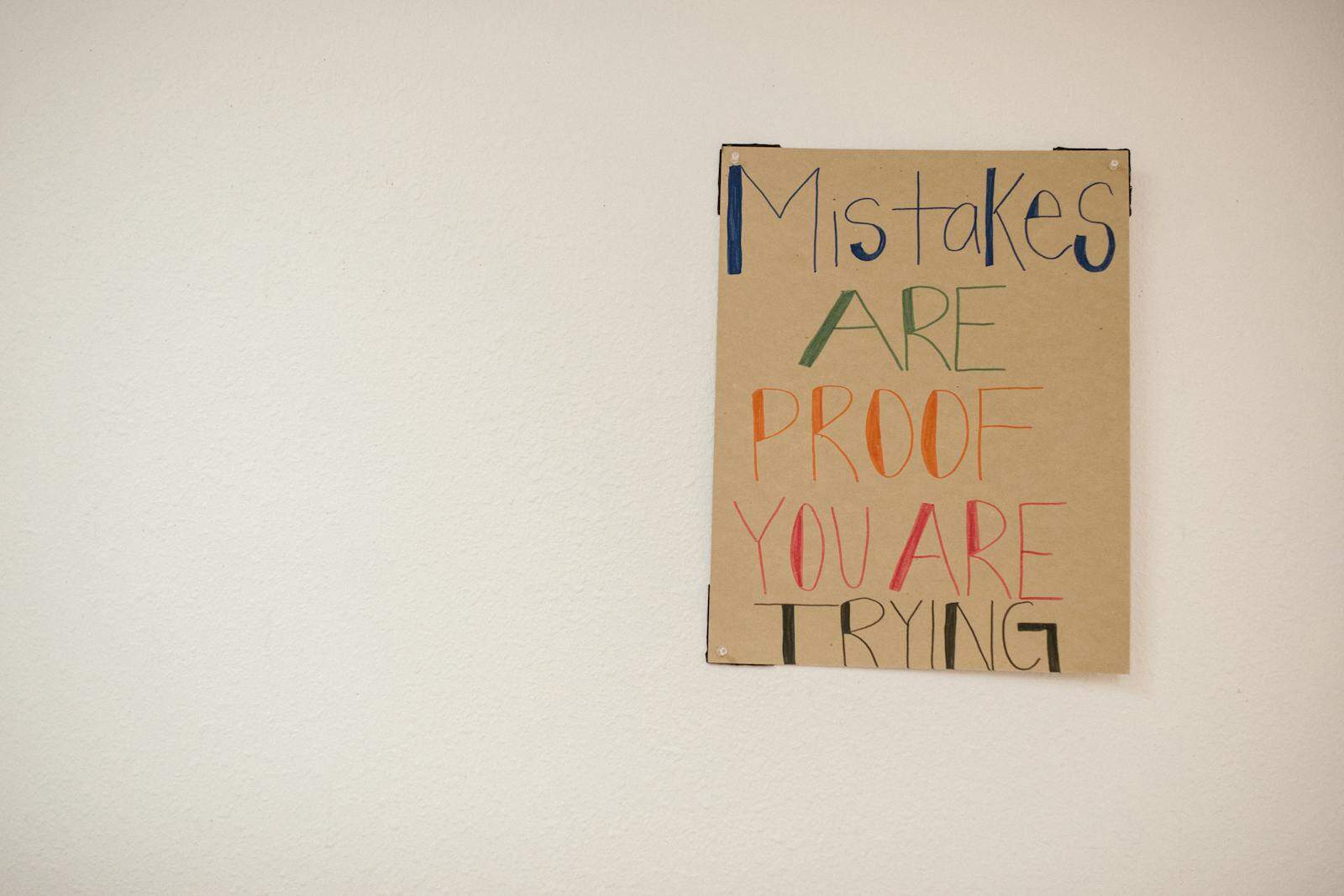 Astrological Aspects, A motivational poster with the phrase 'Mistakes are proof you are trying.'