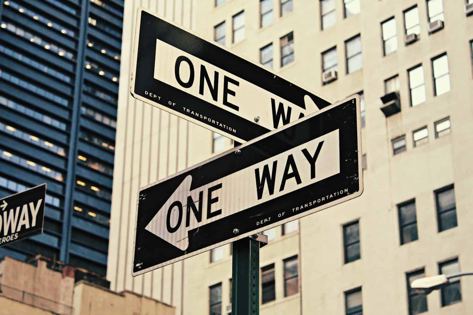 Rising signs, astrology, horoscope, tarot, zodiac, white and black One Way-printed road signages