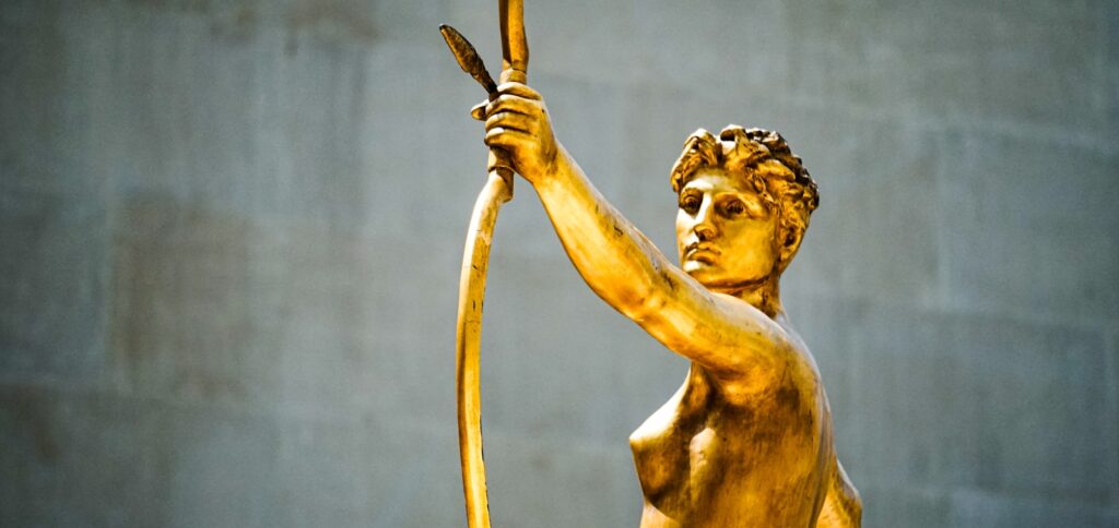 female with arrow statue