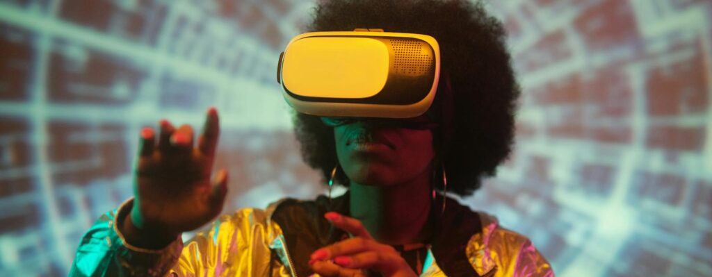Black woman exploring virtual reality with headset and futuristic backdrop. Futurist, midhaven, archetype, zodiac