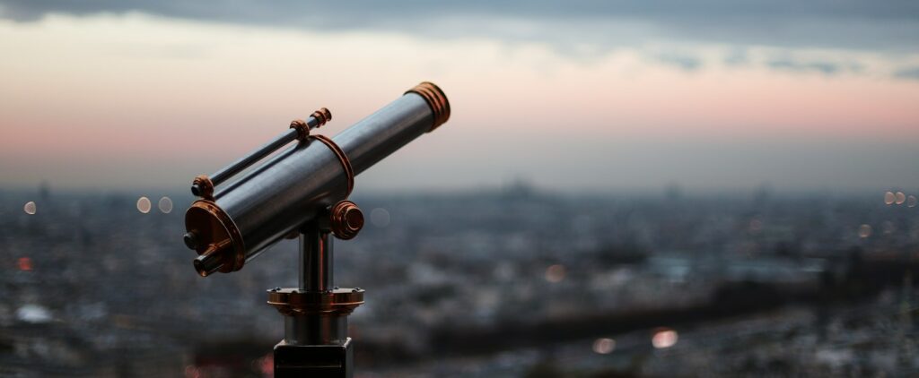 black telescope during day time